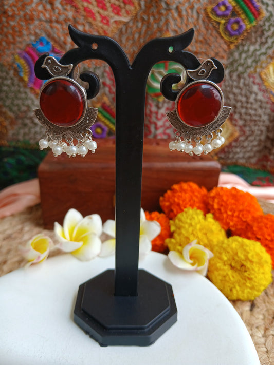Kavya Maroon Studds Aadya's Fashion Blings